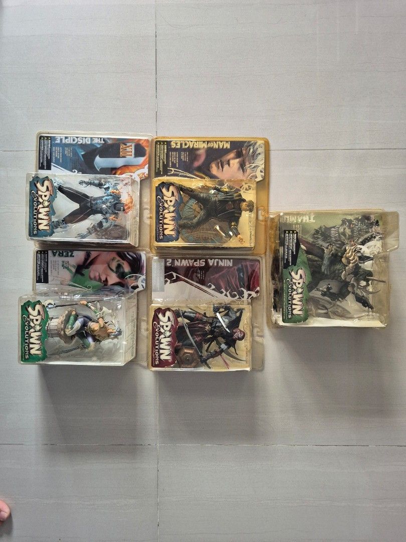 McFarlane Spawn Evolution series (Category: Toy Figures) located in Singapore. Submitted by giraffacus (Listing ID 1393216252, Image 1). Description: Set of 5 McFarlane Spawn Evolutions figures. Condition of boxes varies and can be found in photos. Collector item! .