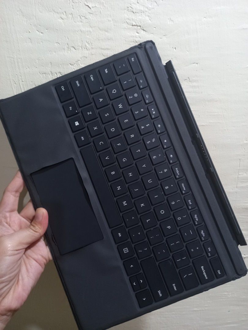 Microsoft type keyboard only (Category: Computer Keyboard) located in Quezon City. Submitted by eilgaraje (Listing ID 1393163472, Image 1). Description: Microsoft Surface Pro 3 / Pro 4 Type Cover (Original) – Black 📌 Description: Gamit na original Microsoft Surface Type Cover na compatible sa Surface Pro 3 at Pro 4. In good working condition — all keys functional, may slight signs of use (see pics), pero walang sira sa keyboard or trackpad. 🔌 C