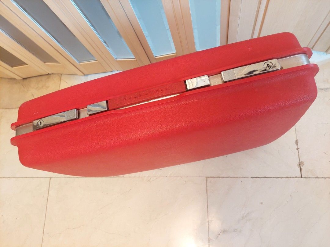 SAMSONITE-Vintage Saturn Red Hard Shell Luggage 25” Suitcase (Category: Luggage) located in Quezon City. Submitted by every2nd_counts (Listing ID 1393072397, Image 2). Description: Very rare piece. Travel in timeless elegance with this collectible Red Samsonite Saturn hard shell suitcase. This luggage is in good vintage condition with signs of wear. There are some minor scuffs here and there on the exterior..
