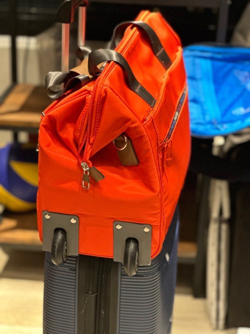 🌟Travel Trolley Parfois With Wheels 🌟 (Category: Luxury Bags & Wallets) located in Makati City. Submitted by anettenhet (Listing ID 1393142284, Image 3). Description: ✨ Never used – still in perfect condition ✨ Spacious & stylish – perfect for travel or work ✨ With elegant ribbon accent & “Special Day” detail strap With wheels ✨ Can be hand-carried or slipped onto luggage handle for easy travel 📌 Condition: Brand New (Just kept in storage, nev