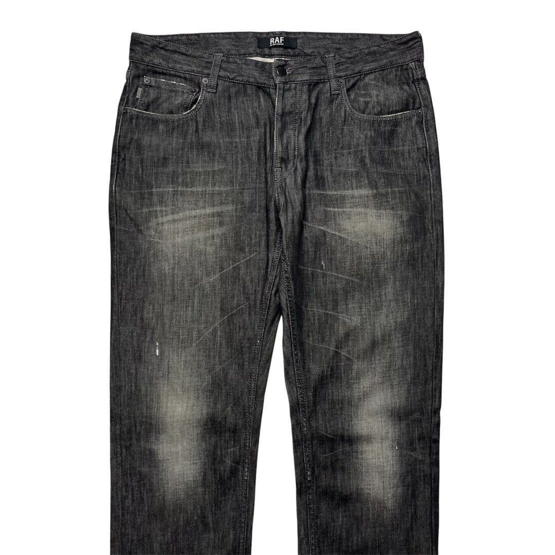 2000s Raf by Raf Simons Faded Denim (Category: Jeans) located in Quezon City. Submitted by jusjawnz (Listing ID 1393337457, Image 2). Description: These jeans from Raf by Raf Simons feature distinct whiskering at the thighs, fading throughout for a worn-in look, and light distressed accents. tagged 34 waist - 17.5 (34) outseam - 45.25 inseam - 34 leg opening - 7.75 5,000 php .