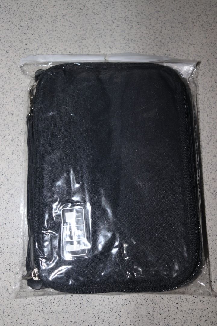 2-Zipper Travel Gadget & Cable Organizer (Category: Laptop Bags & Sleeves) located in Quezon City. Submitted by mabait_na_posa (Listing ID 1393424397, Image 1). Description: Brand new travel gadget bag, perfect for storing and organizing cables, chargers, and small electronics. - 2 separate zipper compartments for better organization - Ideal for travel or everyday use - Black exterior with green interior - Durable and compact design - Thick high 