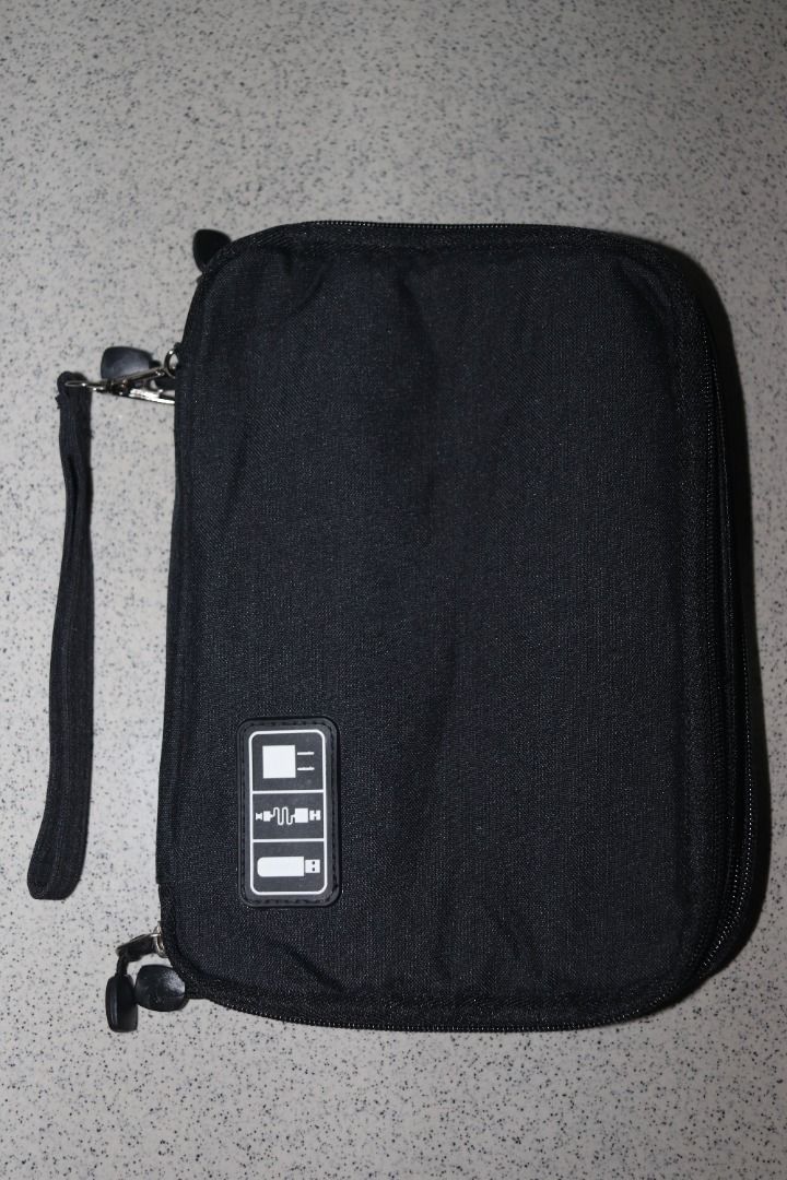 2-Zipper Travel Gadget & Cable Organizer (Category: Laptop Bags & Sleeves) located in Quezon City. Submitted by mabait_na_posa (Listing ID 1393424397, Image 2). Description: Brand new travel gadget bag, perfect for storing and organizing cables, chargers, and small electronics. - 2 separate zipper compartments for better organization - Ideal for travel or everyday use - Black exterior with green interior - Durable and compact design - Thick high 