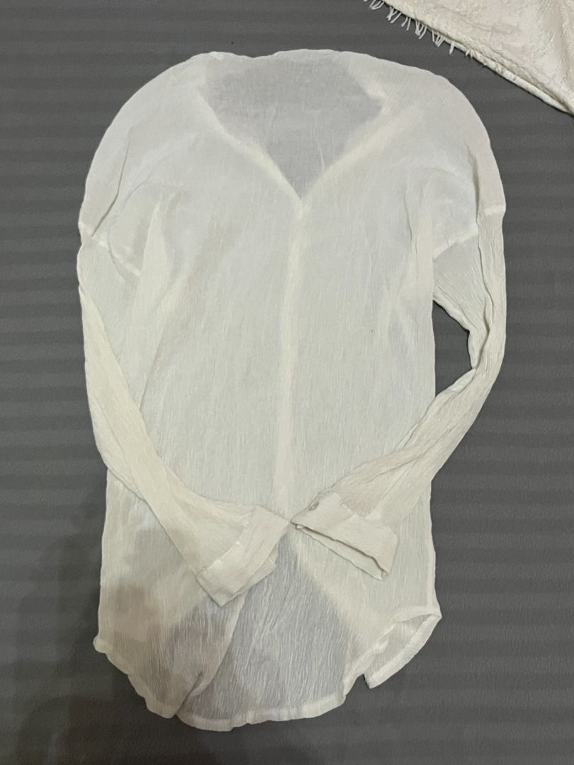 Beachy sheer long sleeved white ribbed polo (Category: Longsleeves) located in San Pedro. Submitted by 111vkk (Listing ID 1393295073, Image 3). Description: ↝ Description: Super cute sheer cover up or layer long sleeved top with nice ribbed texture ↝ Size on tag: None ↝ Fits: S-M ↝ Issues: None ❣ All secondhand, pls manage your expectations! ❣ No ww pics but send a message for the measurements ❣ GCash/bank transfer only.