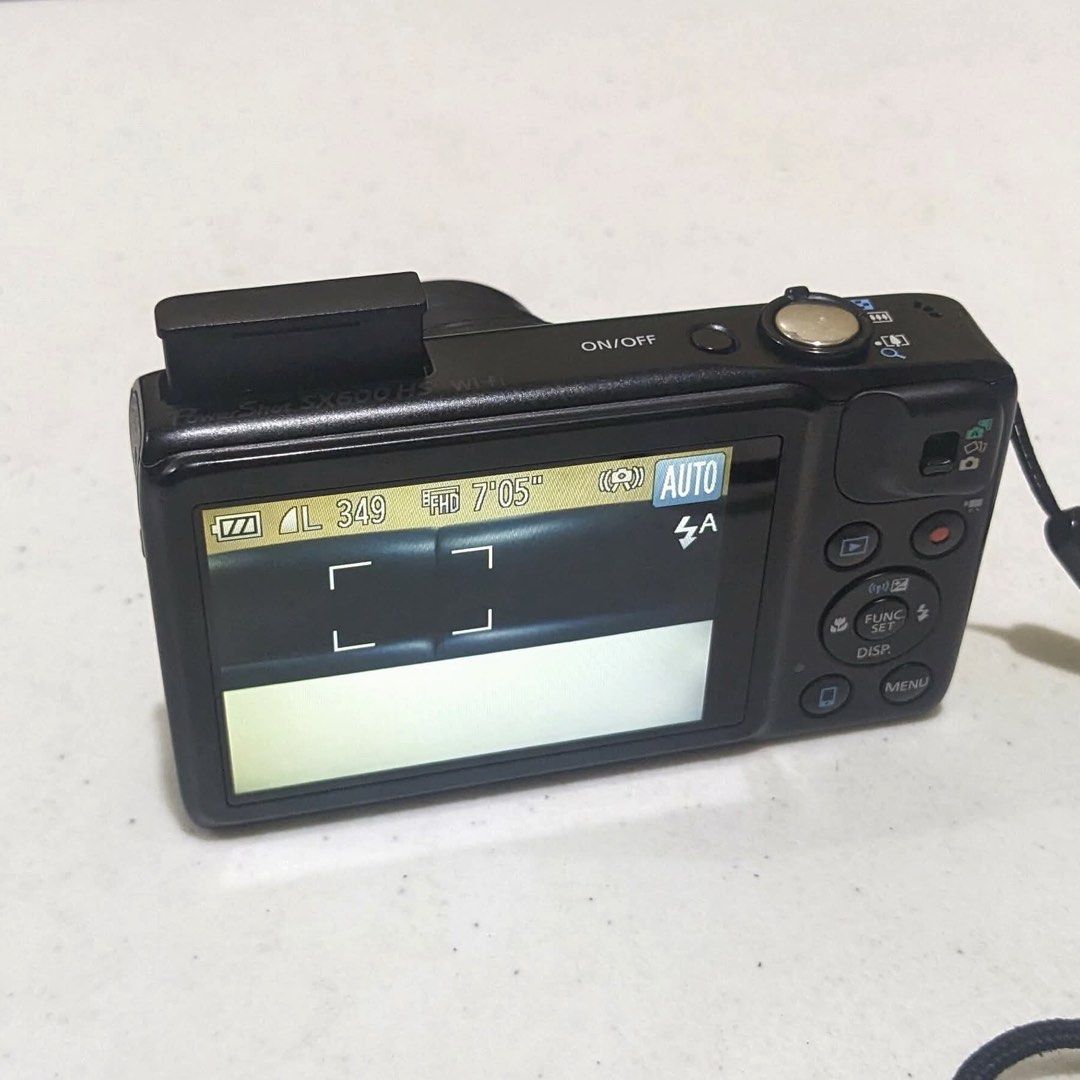 Canon Powershot SX600 HS Digital Camera (Digicam) (Category: Cameras) located in Pasig City. Submitted by _mathilda (Listing ID 1393357781, Image 2). Description: ⊹ ࣪ ˖ Canon Powershot SX600 HS ⊹ ࣪ ˖ — Has built-in Wifi — 16.0 Mega Pixels — 18x Optical Zoom (Can zoom up to 72x) — Has Pop-up Flash — Intelligent & Enhanced Dynamic Image Stabilization (IS) — Full HD Video Recording (1080р) — ISO: 100-3200 — Body Condition: 9.5/10 — In great conditio