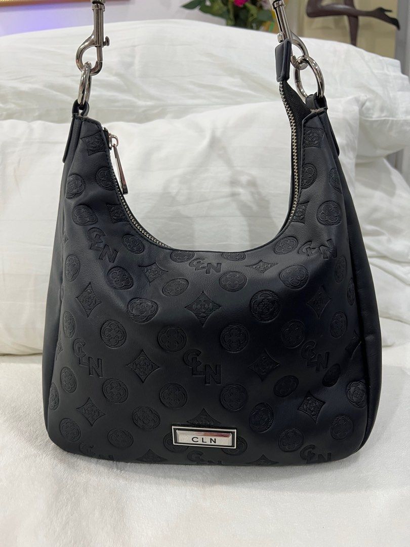 CLN Rosette Shoulder Bag in Black (Category: Shoulder Bags) located in Manila. Submitted by maviii21 (Listing ID 1393311827, Image 1). Description: CLN Rosette Shoulder Bag in Black what i love abt this bag ay super spacious! swearrr ang dami ko nilalagay dito and hindi sya bulky tignan ang cute pa ng shape! 💓 w original dustbag and paper bag!.