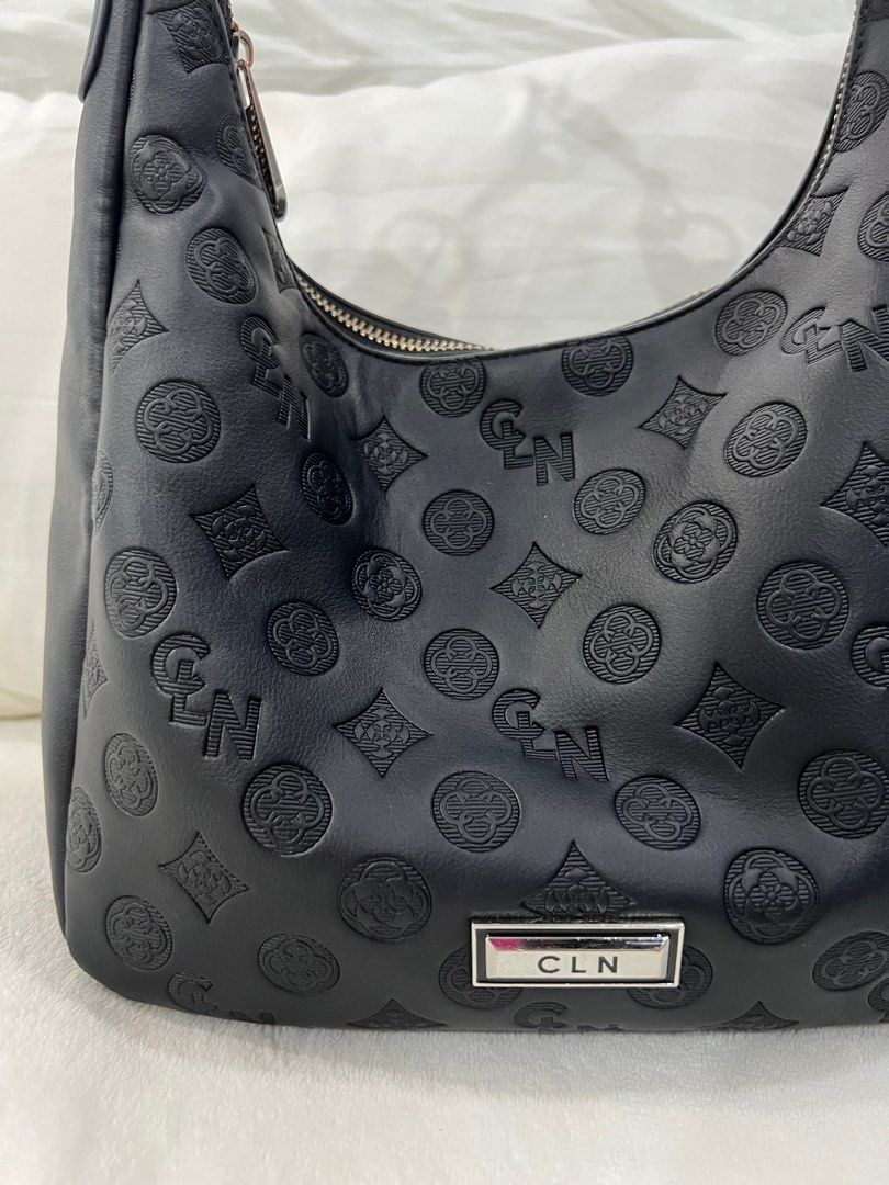 CLN Rosette Shoulder Bag in Black (Category: Shoulder Bags) located in Manila. Submitted by maviii21 (Listing ID 1393311827, Image 3). Description: CLN Rosette Shoulder Bag in Black what i love abt this bag ay super spacious! swearrr ang dami ko nilalagay dito and hindi sya bulky tignan ang cute pa ng shape! 💓 w original dustbag and paper bag!.