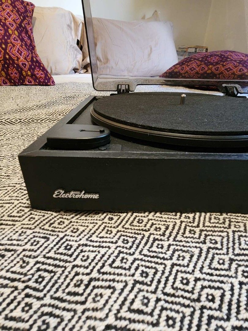 Electrohome 2-speed wireless vinyl record player (Category: Portable Music Players) located in Taguig. Submitted by ninasanti94507 (Listing ID 1393259473, Image 2). Description: Purchased in Canada. Used no more than 5x. Condition is like new but no box. Pick up or Lalamove only from ML Quezon Avenue, Taguig. Specs: Electrohome Montrose Wireless Vinyl Record Player 2-Speed Belt-Drive Turntable, with Audio-Technica Stylus, Bluetooth, Vinyl-to-MP3 