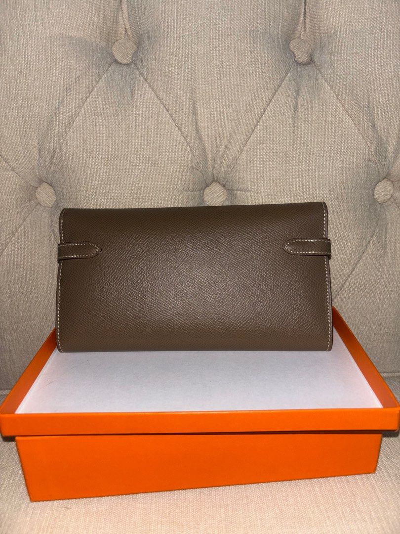 Hermes kelly etoupe long wallet (Category: Luxury Bags & Wallets) located in Quezon City. Submitted by icequizon (Listing ID 1393283172, Image 3). Description: 100% authentic Excellent condition Please check the photos for the exact condition Kelly Long wallet Slightly negotiable No strap .