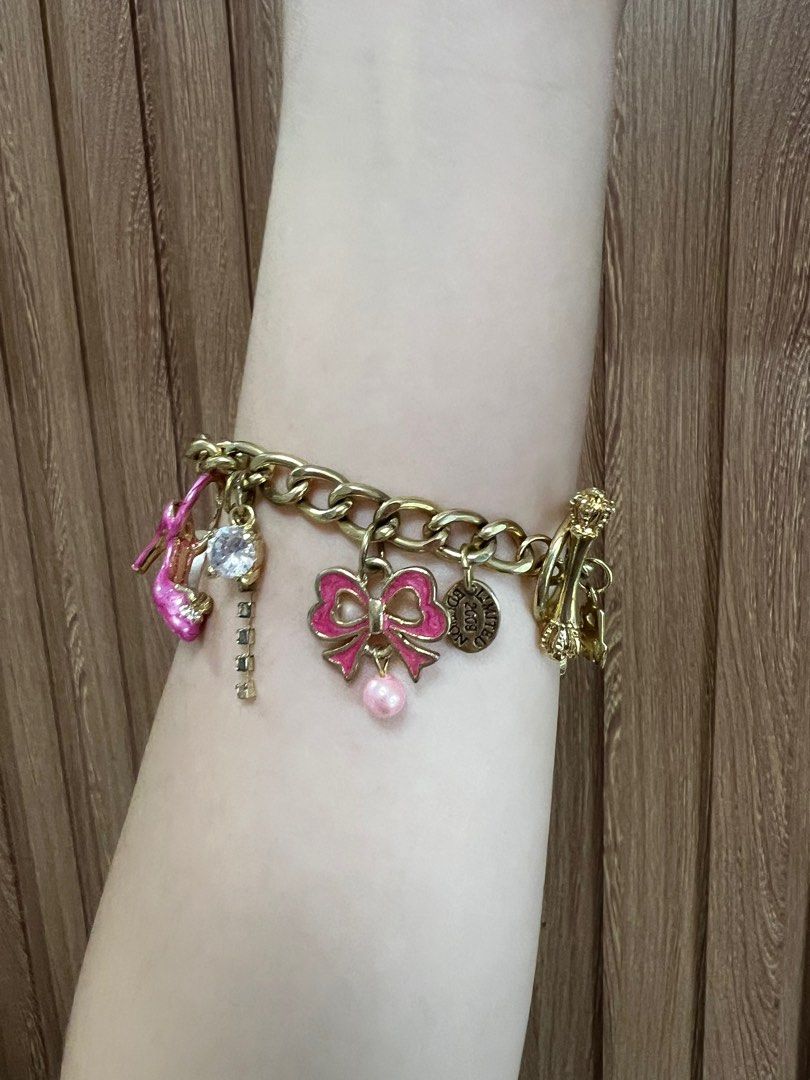 Juicy couture pink charm bracelet (Category: Bracelets) located in Cainta. Submitted by chainm (Listing ID 1393261864, Image 1). Description: Bracelet only No original box Can provide jewerly case Last price listed! .