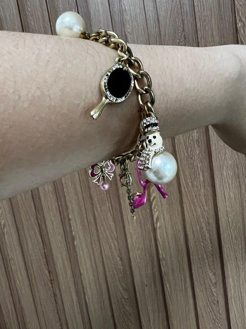 Juicy couture pink charm bracelet (Category: Bracelets) located in Cainta. Submitted by chainm (Listing ID 1393261864, Image 3). Description: Bracelet only No original box Can provide jewerly case Last price listed! .
