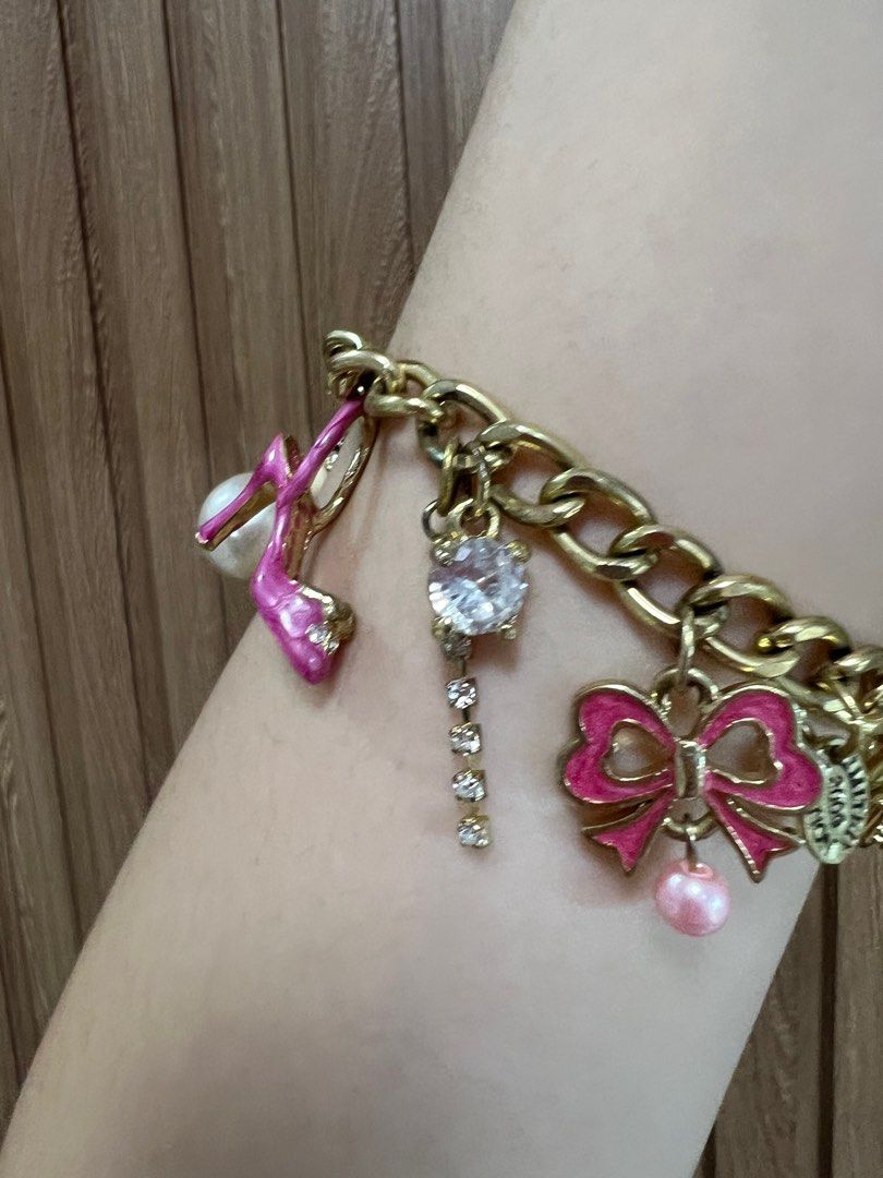Juicy couture pink charm bracelet (Category: Bracelets) located in Cainta. Submitted by chainm (Listing ID 1393261864, Image 2). Description: Bracelet only No original box Can provide jewerly case Last price listed! .
