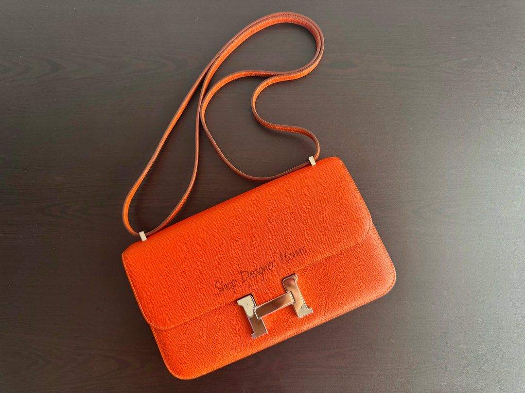 Pre-owned Hermes Elan Constance Epsom Feu PHW (Category: Luxury Bags & Wallets) located in Quezon City. Submitted by shopdesigneritems (Listing ID 1393313972, Image 1). Description: 100% Authentic Good Condition Color: Feu Palladium Hardware Epsom Material Comes with hermes box, dustbag For inquiries: +639053333168 Email: shopdesigneritems@yahoo.com IG: shopdesigneritems.