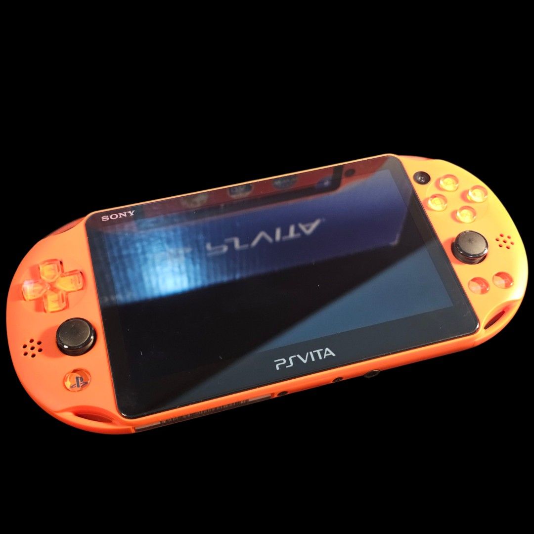 PS Vita Slim Neon Orange (Category: PlayStation) located in Paranaque City. Submitted by john020497 (Listing ID 1336657360, Image 2). Description: - Around 99 percent smoothness, good item for collectors. - With box, manuals, charger, case, bag, analog grips and 4GBofficial memory card. Screen protected front and back. - No issue. - Unmodded but can be modded upon request. Parañaque area. Delivery via Lalamove/Grab/LBC..