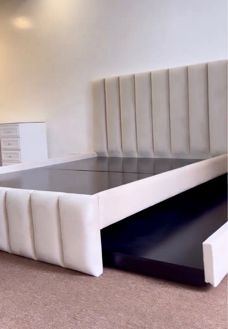 Queen size bed frame with pull out (Category: Bed Frames & Mattresses) located in Manila. Submitted by beaumontandco (Listing ID 1393263564, Image 2). Description: Custom made Queen sized bed frame (no mattress) In beige color With pull out bed under Pls send me your offers.