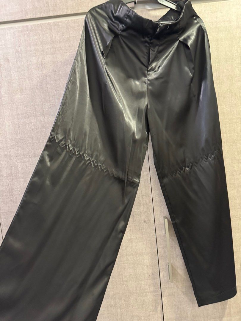 Satin slacks (Category: Other Bottoms) located in Taguig. Submitted by maybsv (Listing ID 1393270474, Image 2). Description: Never been use too big for me. Medyo pumayat kasi. Hanger marks lng yun sa may gusot part. .