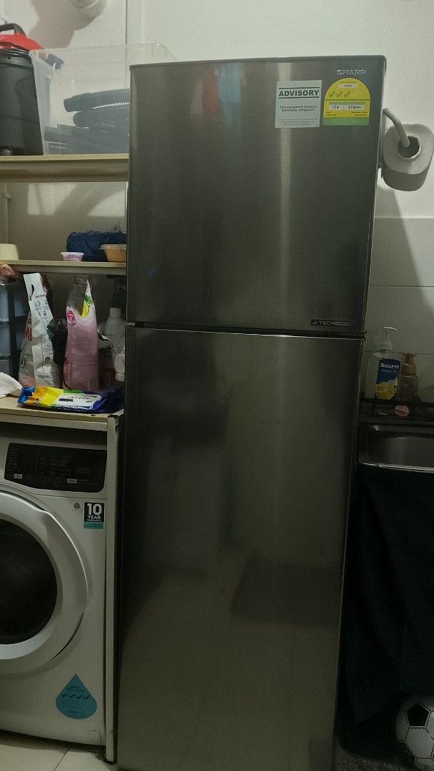 Sharp refridgerator (Category: Refrigerators & Freezers) located in Singapore. Submitted by nfclozet (Listing ID 1393395783, Image 1). Description: - Used Sharp refrigerator - Stainless steel finish - Good working condition - Includes stickers Need to clear by tomorrow afternoon.