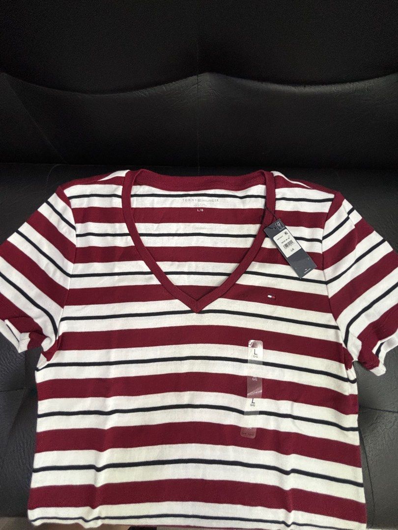 Tommy Hilfiger V-neck shirt (Category: Blouses) located in Manila. Submitted by laineeo (Listing ID 1393329657, Image 1). Description: .