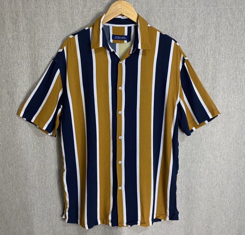 Zara - Stripe button Up shirt (Category: Activewear) located in Cabuyao City. Submitted by _streetflavor (Listing ID 1393407546, Image 1). Description: Zara - Stripe button Up shirt Excellent Size: medium Length: 29 Width: 23 -299 pesos Issue check pictures Dm.