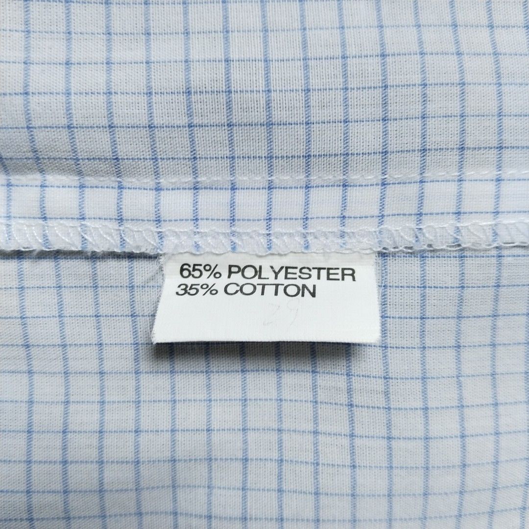 AntonHill | Graph Check Short-sleeve Shirt (Category: Tshirts & Polo Shirts ) located in Batangas. Submitted by second_cycle (Listing ID 1393476627, Image 2). Description: •65% polyester, 35% cotton •white fabric w/ thin blue graph check pattern •17" shoulder width •21" shirt width •8" short sleeve length •27" from collar base to hem •Mandarin collar ✅ no rips or loose threads ✅ no stains; original buttons 🫧 washed and pressed before ship out 🔵