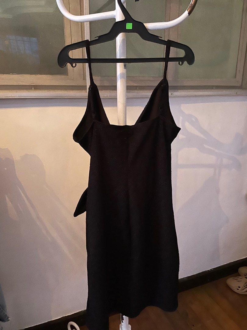 Black Glittery Wrap Mini Dress with Side Bow (Category: Evening dresses & gowns) located in Manila. Submitted by azishops (Listing ID 1393545518, Image 2). Description: Size: large (but fits medium frames) Color: black Rfs: decluttering Pay as you order Mop: gcash/maya Shipping: lalamove (same day), j&t delivery once a week, shouldered by buyer.