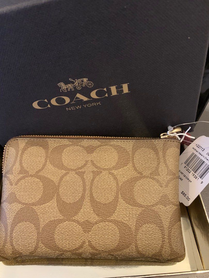 BRAND NEW AUTHENTIC COACH WRISTLET WALLET (Category: Luxury Bags & Wallets) located in Caloocan City. Submitted by siahsha (Listing ID 1393482098, Image 2). Description: BRAND NEW AUTHENTIC COACH WRISTLET WALLET. NAKATABI LANG NEVER NAGAMIT, NAGKAROON NG PARANG DISCOLORATION SA FRONT PERO INTACT LAHAT, COMPLETE WITH TAGS AND BOX. RFS NANGHIHINAYANG AKONG GAMITIN 🤣.