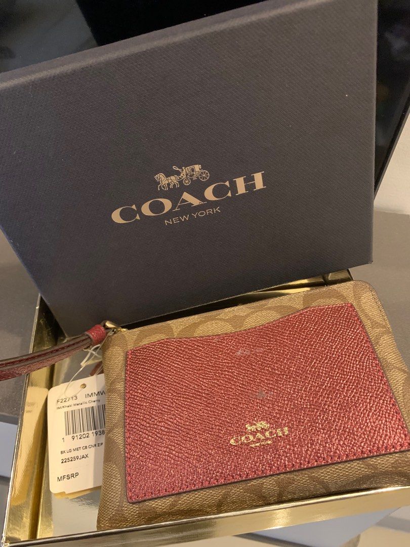 BRAND NEW AUTHENTIC COACH WRISTLET WALLET (Category: Luxury Bags & Wallets) located in Caloocan City. Submitted by siahsha (Listing ID 1393482098, Image 1). Description: BRAND NEW AUTHENTIC COACH WRISTLET WALLET. NAKATABI LANG NEVER NAGAMIT, NAGKAROON NG PARANG DISCOLORATION SA FRONT PERO INTACT LAHAT, COMPLETE WITH TAGS AND BOX. RFS NANGHIHINAYANG AKONG GAMITIN 🤣.