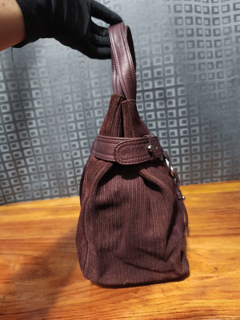 Charriol suede leather handbag (Category: Luxury Bags & Wallets) located in Baguio. Submitted by queenlyne_vintage_rare_finds (Listing ID 1393480805, Image 3). Description: Elegant Charriol tote bag in a rich burgundy corduroy. Features leather accents, silver-tone hardware, and double handles. The interior is lined with a matching fabric and includes a zippered pocket. The bag has a structured shape with decorative straps and rings. Measurements