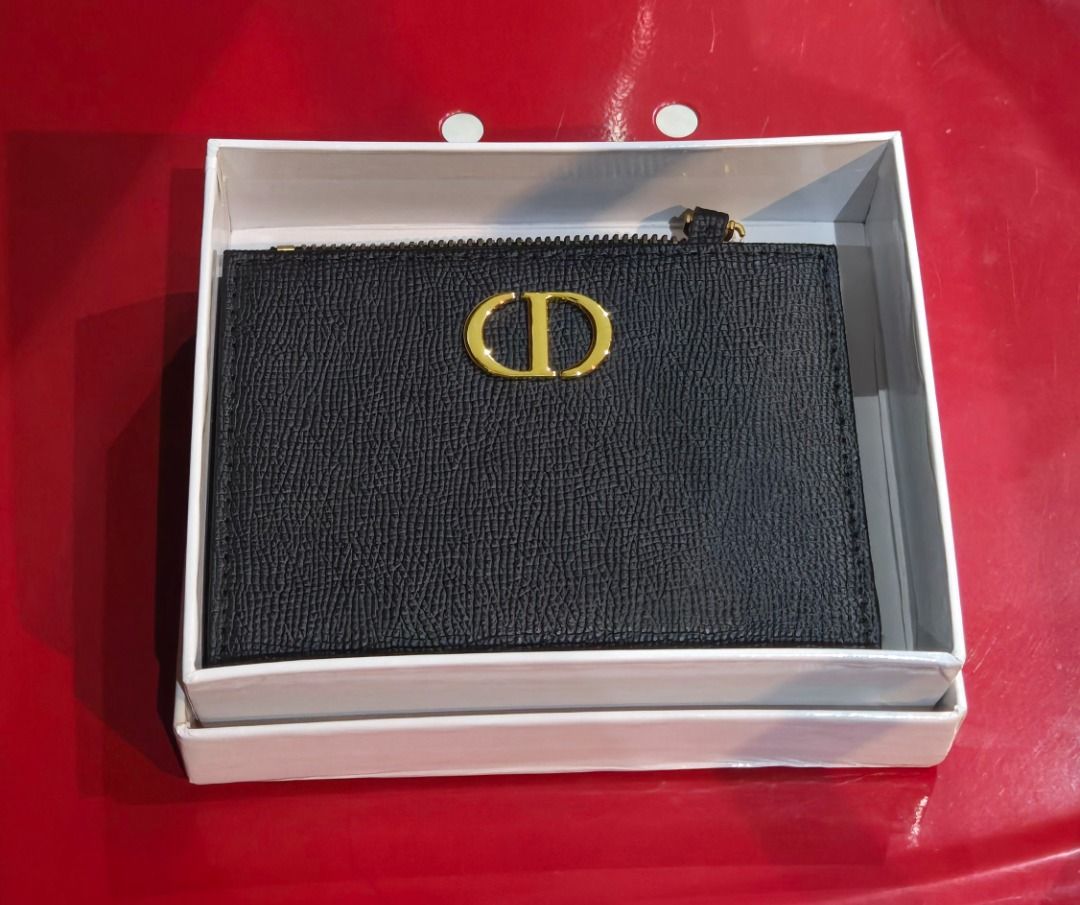 Dior bifold wallet (Category: Luxury Bags & Wallets) located in Caloocan City. Submitted by Sacha88 (Listing ID 1393447094, Image 3). Description: Selling for a friend Dior wallet brand new condition Not Authentic po (was gifted by a friend who didnt know to check authenticity) -nabudol😅😛 she paid more than the value .
