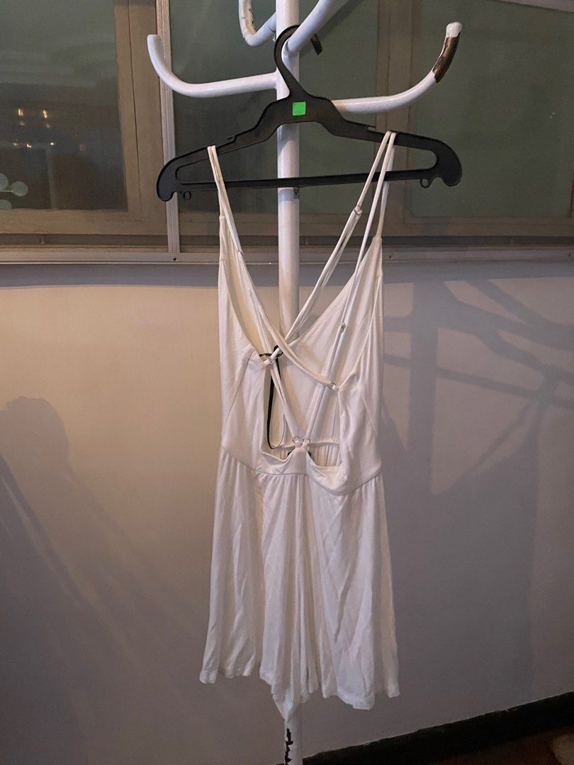 Forever 21 White Strappy Backless Romper (Category: Rompers) located in Manila. Submitted by azishops (Listing ID 1393545742, Image 2). Description: Size: small Color: white Used once Rfs: decluttering Pay as you order Mop: gcash/maya Shipping: lalamove (same day), j&t delivery once a week, shouldered by buyer.