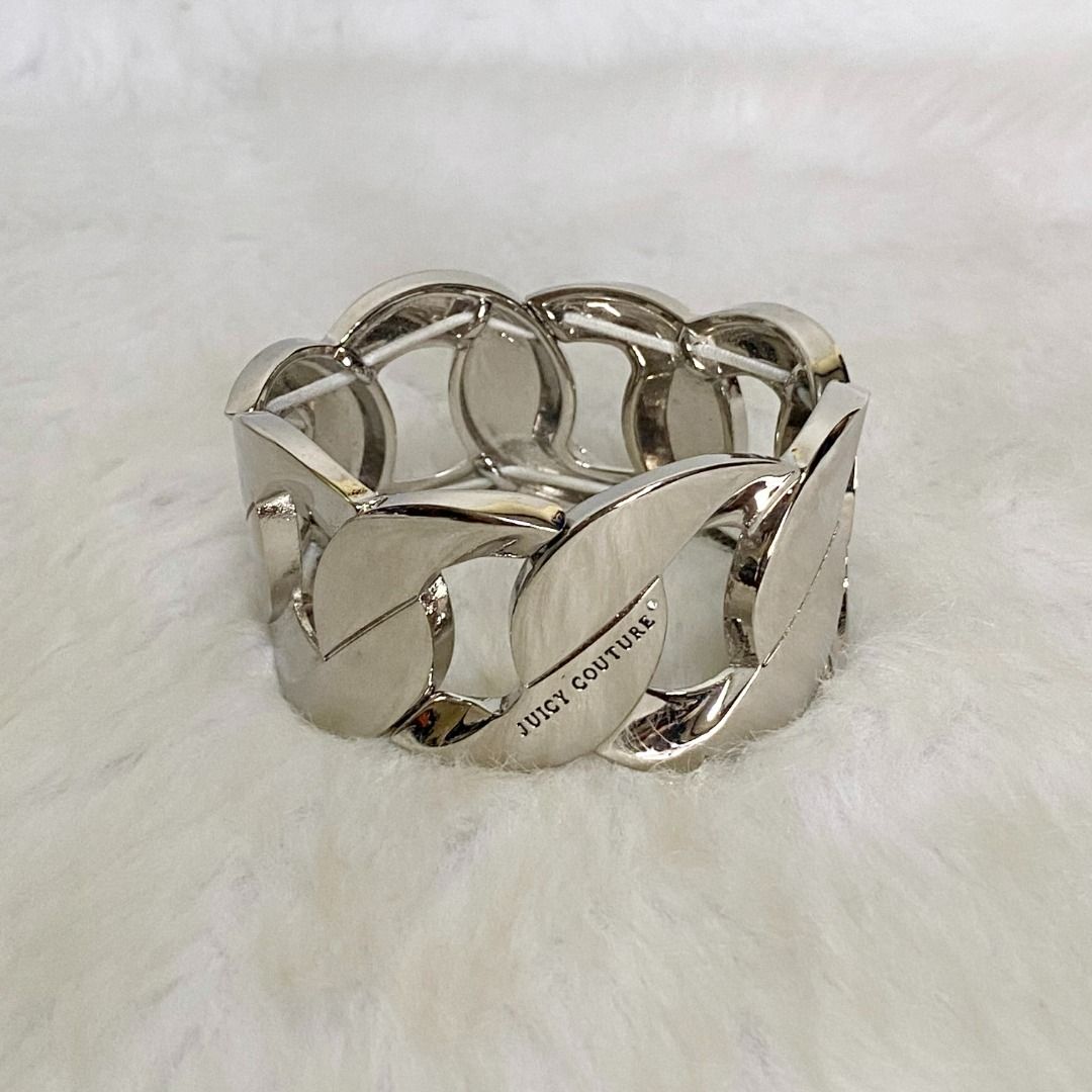 Juicy Couture Silver Chain Bangle Bracelet (Category: Bracelets) located in Cebu City. Submitted by posh_avenue888 (Listing ID 1393491106, Image 3). Description: In very good condition. From Japan. 2.5 inches diameter x 1.35 inch width. 100% authentic!!! .