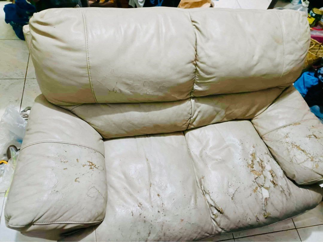 Leather Sofa/couch (Category: Sofas) located in Makati City. Submitted by lovegoldie (Listing ID 1392458798, Image 3). Description: Genuine leather and needs cleaning. The sofa has some scratches that count as defects. Shipping c/o buyer.