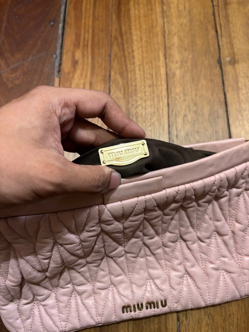 Miu Miu Clutch Bag (Category: Luxury Bags & Wallets) located in Batangas. Submitted by urbanhunter. (Listing ID 1393586646, Image 3). Description: Miu Miu Clutch Bag Issue: last pic 2500 free shipping.