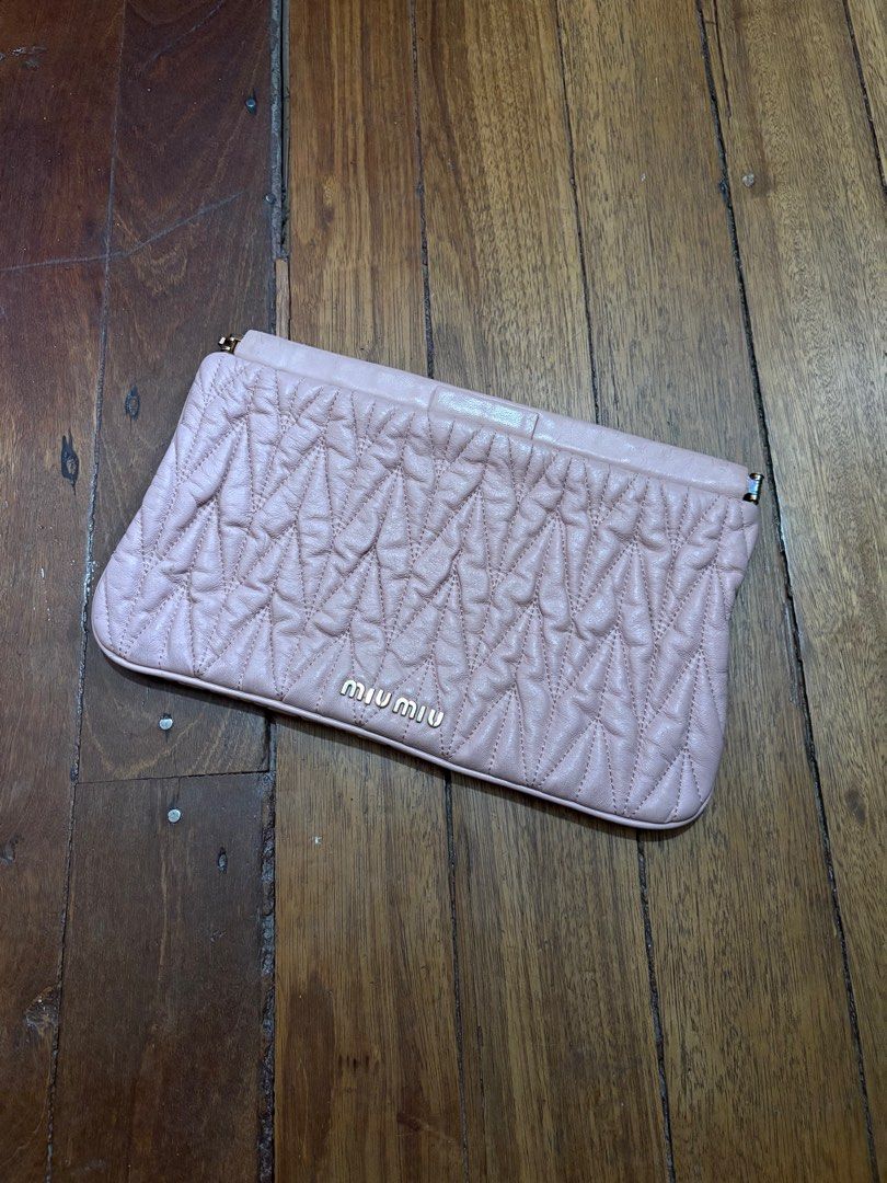 Miu Miu Clutch Bag (Category: Luxury Bags & Wallets) located in Batangas. Submitted by urbanhunter. (Listing ID 1393586646, Image 1). Description: Miu Miu Clutch Bag Issue: last pic 2500 free shipping.