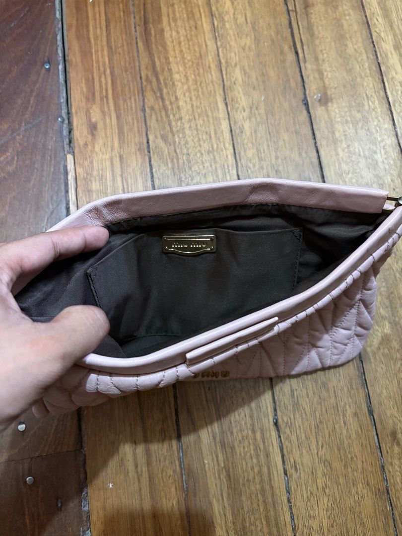 Miu Miu Clutch Bag (Category: Luxury Bags & Wallets) located in Batangas. Submitted by urbanhunter. (Listing ID 1393586646, Image 2). Description: Miu Miu Clutch Bag Issue: last pic 2500 free shipping.