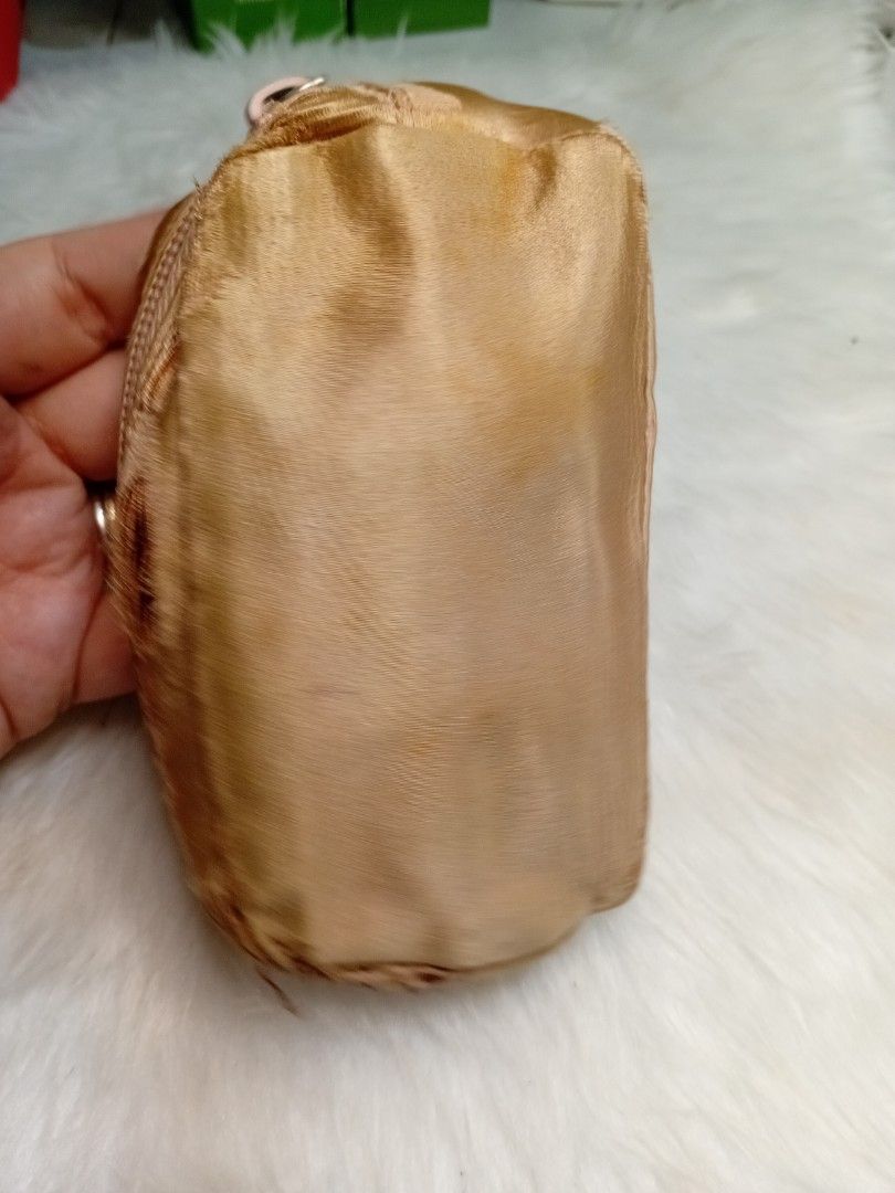 Prada project (Category: Luxury Bags & Wallets) located in Antipolo. Submitted by prelovedcloseta (Listing ID 1393461315, Image 2). Description: auth prada small pouch preloved still usable pwede lgya. ng patches ung may issue with white tag lampo zipper options n pwede tahiin o lagyan ng patches para may design cya.