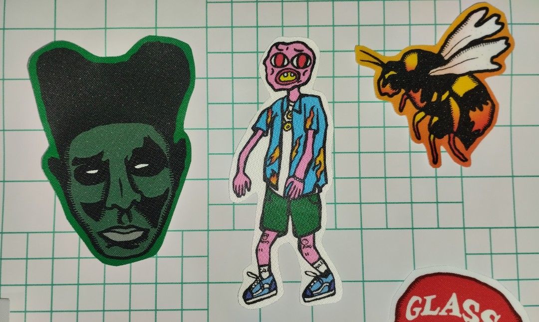 Tyler The Creator sticker pack (Category: Art & Prints) located in Paranaque City. Submitted by nathan4you (Listing ID 1393556625, Image 3). Description: - I designed these digitally (Adobe Photoshop). - Vinyl stickers with fabric laminate - Sizes range from 3-4 inches - Sold per pack Price list: 4-pack - 120 5-pack - 150 7-pack - 200 - Lalamove for online buyers Feel free to pm if interested 😬.