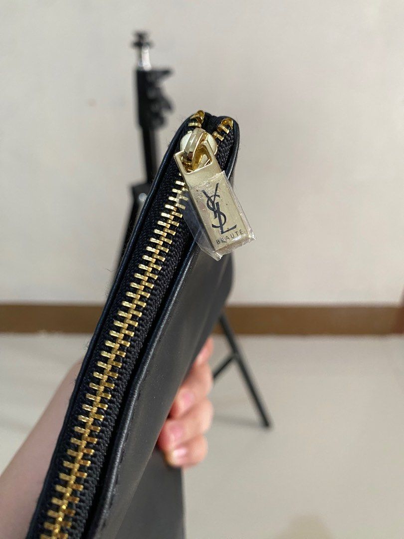 YSL Black Pouch (Category: Luxury Bags & Wallets) located in Lucena. Submitted by catherineluces18 (Listing ID 1393535673, Image 3). Description: ♾️ no flaws ♾️need wash ♾️ zipper's working ♾️ very good condition 🎀 COLOR MAY VARY DUE TO LIGHTING. 🎀 PRE-LOVED/UKAY from SOUTH 🇰🇷..