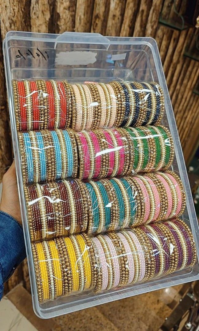 Bangles set (Category: Other Accessories) located in Singapore. Submitted by pipo23 (Listing ID 1390308384, Image 4). Description: A BEAUTIFUL COMBO WITH 12 COLOURS 12 SET BOX AVAILABLE IN SIZE 2.2 TO 2.10 BEST OF BEST QUALITY PRE ORDER : 2 WEEKS ARRIVAL Full box DEMANDING Best of best boxes.