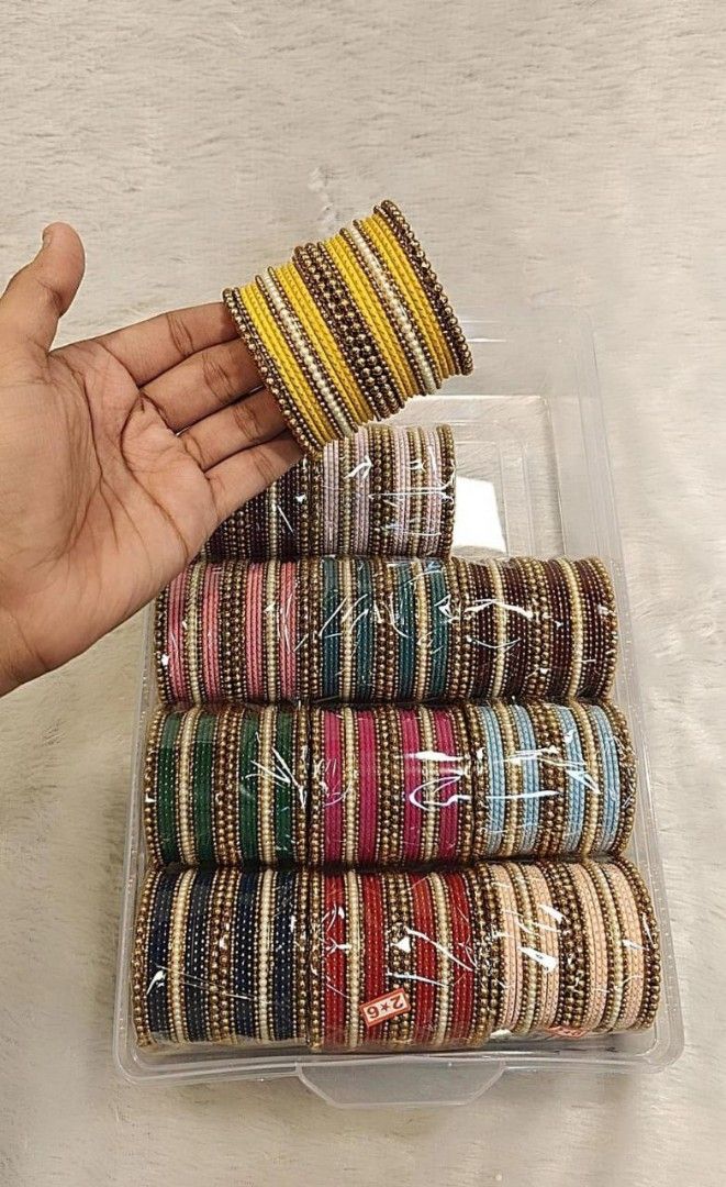 Bangles set (Category: Other Accessories) located in Singapore. Submitted by pipo23 (Listing ID 1390308384, Image 5). Description: A BEAUTIFUL COMBO WITH 12 COLOURS 12 SET BOX AVAILABLE IN SIZE 2.2 TO 2.10 BEST OF BEST QUALITY PRE ORDER : 2 WEEKS ARRIVAL Full box DEMANDING Best of best boxes.