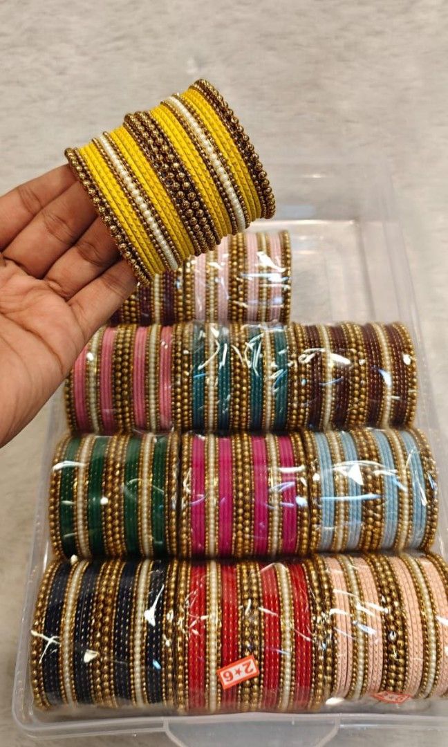 Bangles set (Category: Other Accessories) located in Singapore. Submitted by pipo23 (Listing ID 1390308384, Image 6). Description: A BEAUTIFUL COMBO WITH 12 COLOURS 12 SET BOX AVAILABLE IN SIZE 2.2 TO 2.10 BEST OF BEST QUALITY PRE ORDER : 2 WEEKS ARRIVAL Full box DEMANDING Best of best boxes.