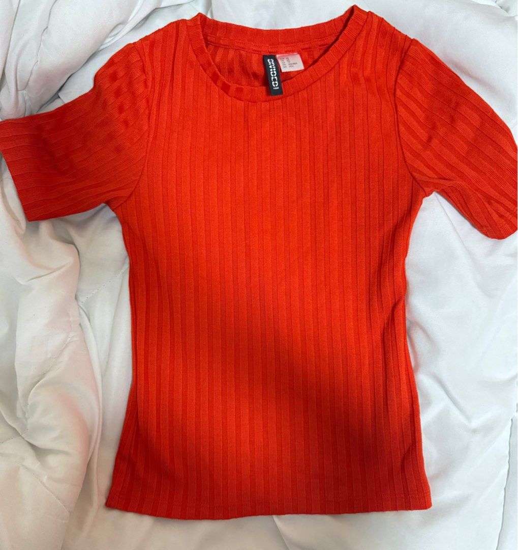 ribbed orange top (Category: Blouses) located in Cainta. Submitted by audieu (Listing ID 1390308033, Image 1). Description: fits xs cute vibrant colour .