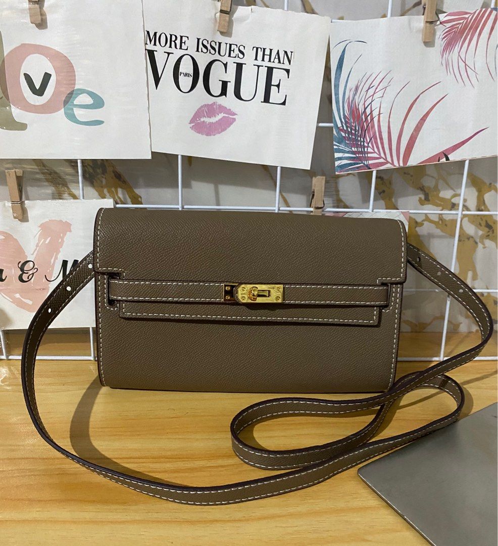 HQ sling bag (Category: Cross-body Bags) located in Naga. Submitted by taurusg (Listing ID 1390414001, Image 1). Description: Small size wallet sling detachable strap No issue Malinis .