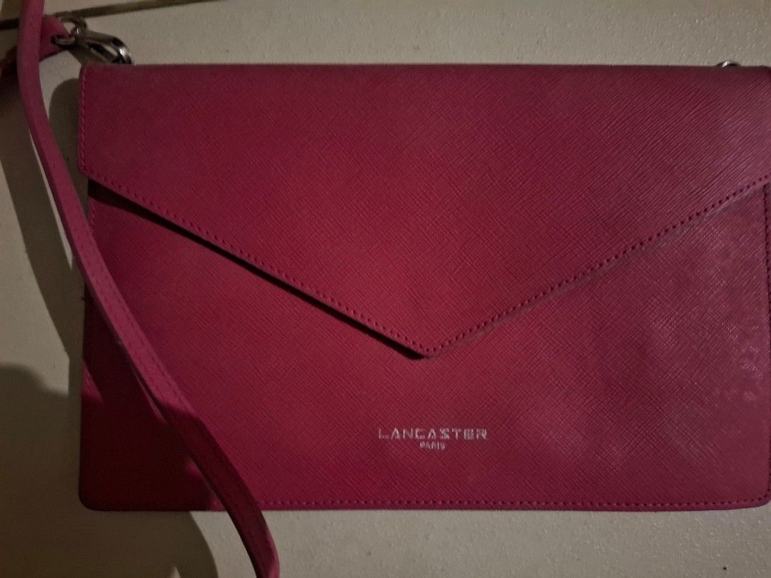 MAGENTA ENVELOPE CLUTCH BAG | LANCASTER PARIS (Category: Luxury Bags & Wallets) located in Manila. Submitted by lasera (Listing ID 1390345673, Image 1). Description: negotiable - originally bought for 5k.