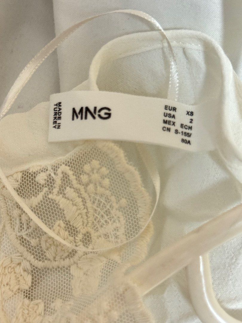 white flowy blouse lace longsleeves (Category: Blouses) located in Cainta. Submitted by audieu (Listing ID 1390307477, Image 3). Description: bought from mango podium white lace kinda silk material longsleeves fits xs-small rfs: never worn, not my style.