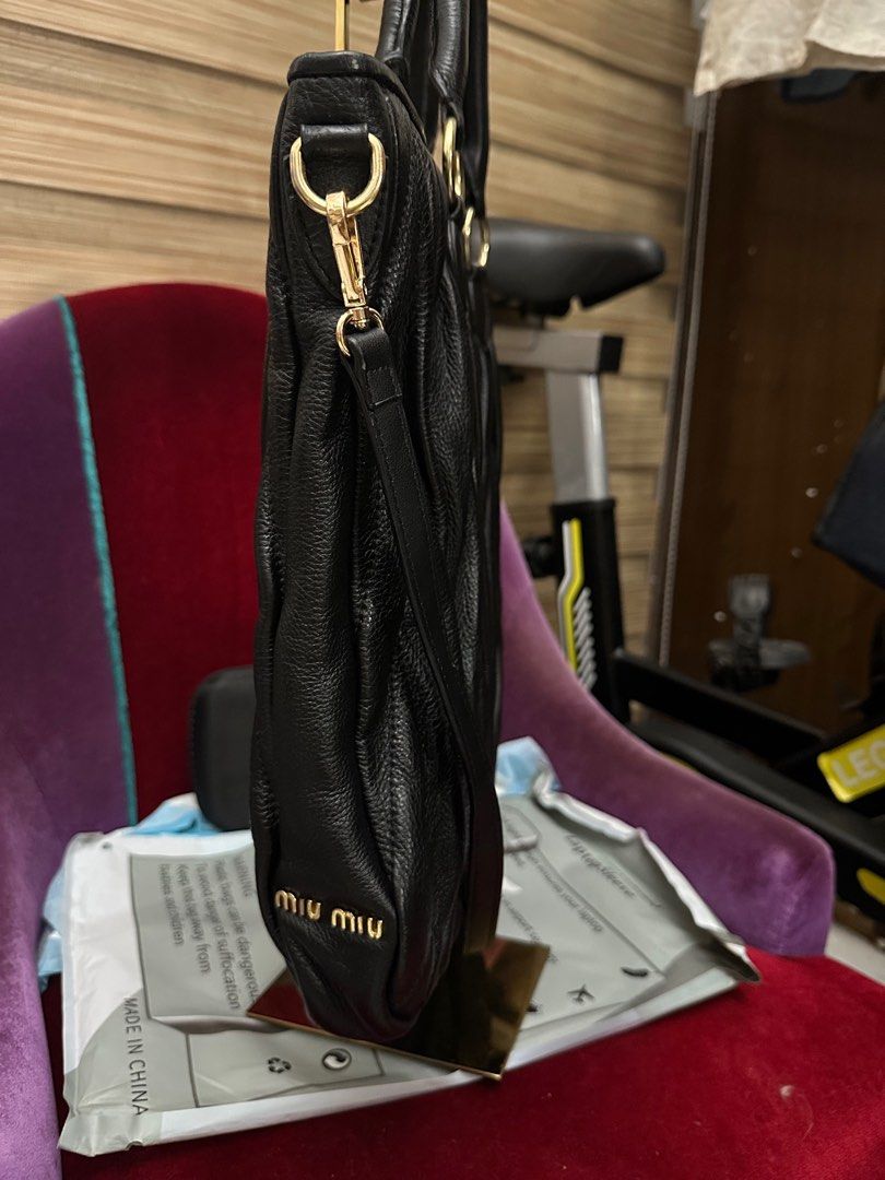 Miu Miu Gathered Leather Tote (Category: Luxury Bags & Wallets) located in Pasig City. Submitted by fashionalternatives (Listing ID 1390373950, Image 2). Description: Miu Miu Gathered Leather Two Way 35cmx 36cm Tote Bag showcases the brand’s signature quilting technique, offering a luxurious, textured design in classic black #MiuMiu Replaced Sling Lampo Zipper Last 2pics for reference only .