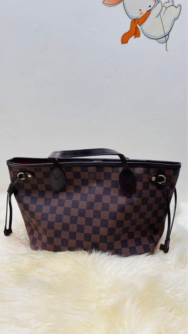 Neverful PM Ebene Damier (Category: Luxury Bags & Wallets) located in San Juan City. Submitted by kriszy_coo (Listing ID 1390269839, Image 3). Description: Neverfull PM Damier Ebene Date Code AR2142 Php 66,000 Bought in Japan.