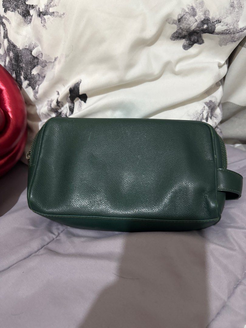 Original Kenzo Leather Clutch Bag (Category: Luxury Bags & Wallets) located in Cebu City. Submitted by timeninja (Listing ID 1390315646, Image 2). Description: Original. Genuine Leather. In good condition. Cebu City area..