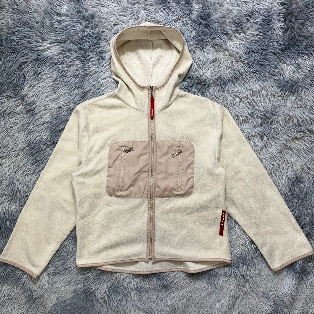 Prada Fleece Red tab jacket (Category: Luxury Apparel) located in Dumaguete. Submitted by dgte.grails (Listing ID 1390343939, Image 1). Description: Prada Fleece Red tab jacket 20 width 22 length Excellent condition 1500 Pm.