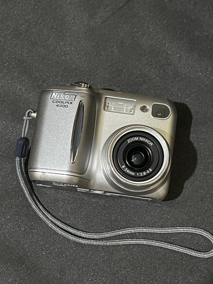 rush sale : nikon coolpix 4300 (Category: Cameras) located in Pasig City. Submitted by _duhrl (Listing ID 1390392385, Image 1). Description: comes with pouch, battery, and sd card honest issue: sometimes turns off on its own, but might just need a battery replacement.